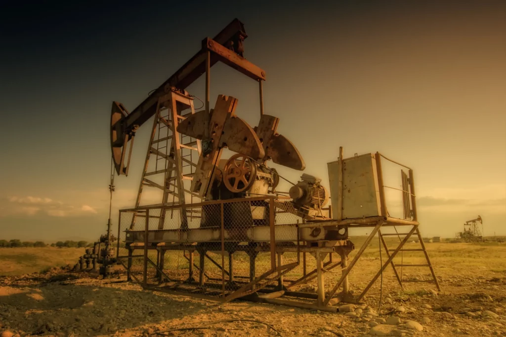 Artistic image of a Pumpjack on a dusty day.